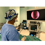 Endoscopic ENT surgery using advanced surgical imaging equipment.png